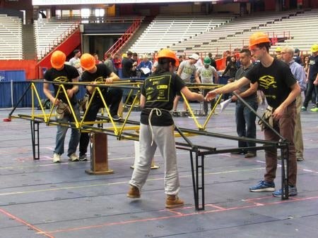 Students demonstrate their bridge in a previous competition.