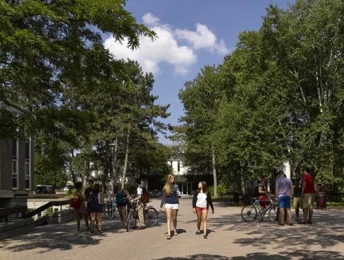 Students walk in front of Waterloo's Arts Lecture Hall.