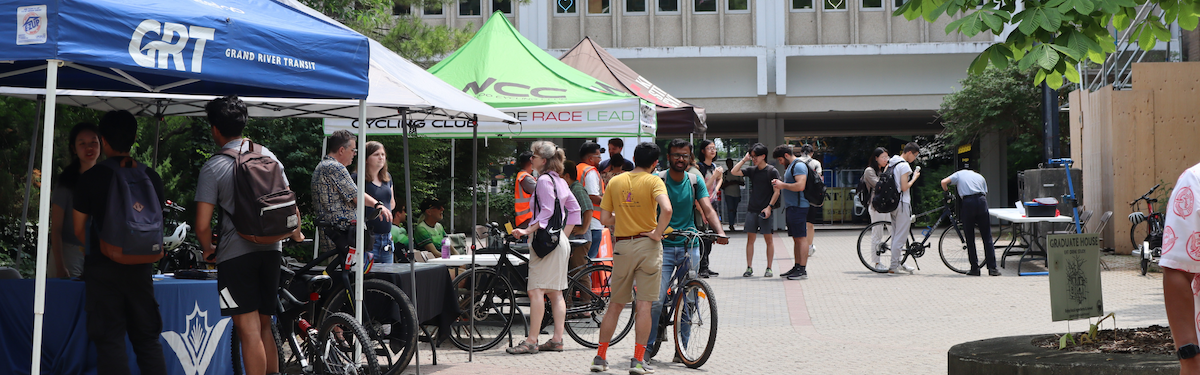 Booths and tents set up for a bike fair on the University campus.