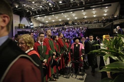 The Chancellor's procession takes the stage at Convocation.