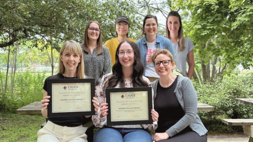 The WatSPEED team with the award certificates.