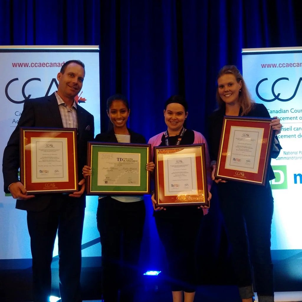 Waterloo representatives hold plaques at the Prix D'Excellence Awards.