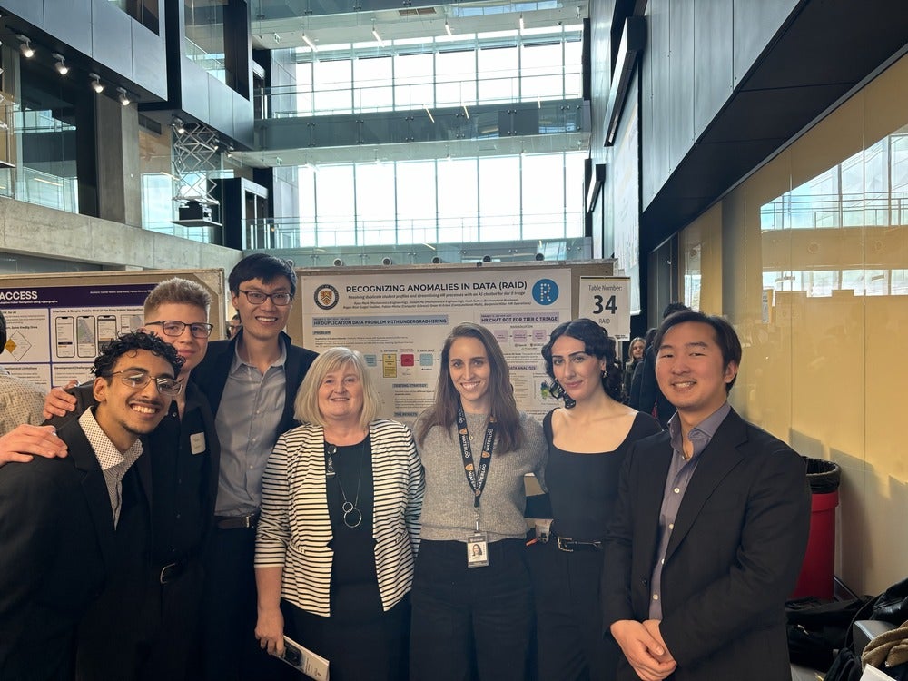 Members of the project team with Sarah Hadley, Chief Financial Officer and Chief Human Resources Officer Michelle Hollis