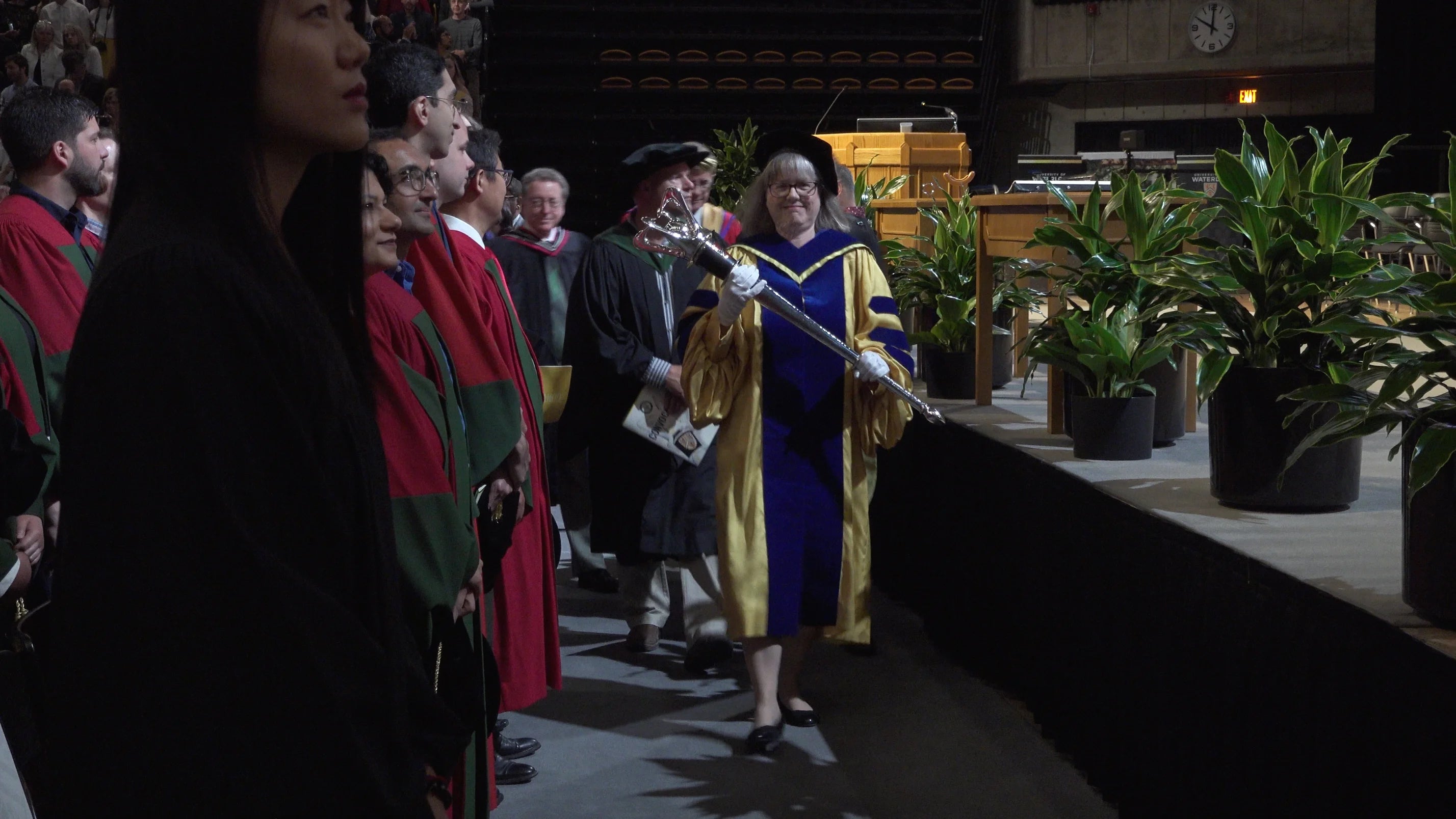 Professor Donna Strickland carries the mace at the Science Convocation ceremony on Thursday, June 13.