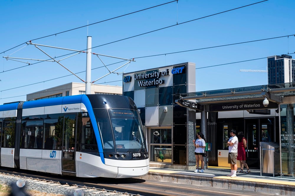 ION light rail train arrives at University of Waterloo station.