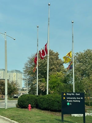 Flags at the University of Waterloo at half mast.