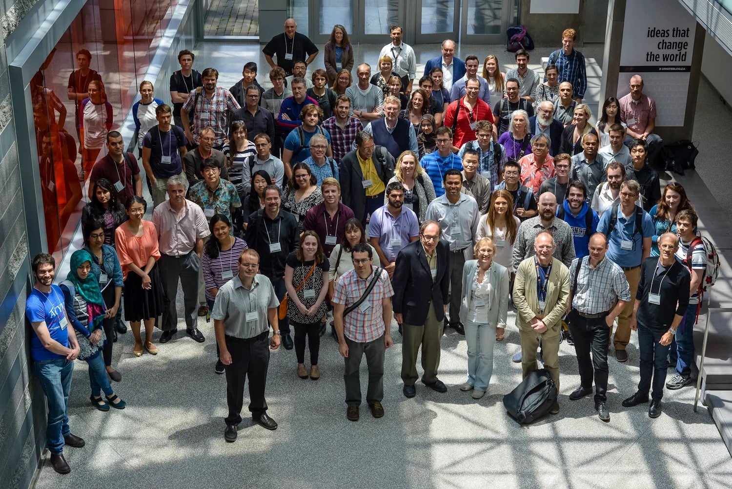 Delegates pose for a group photo in the Lazaridis Centre.