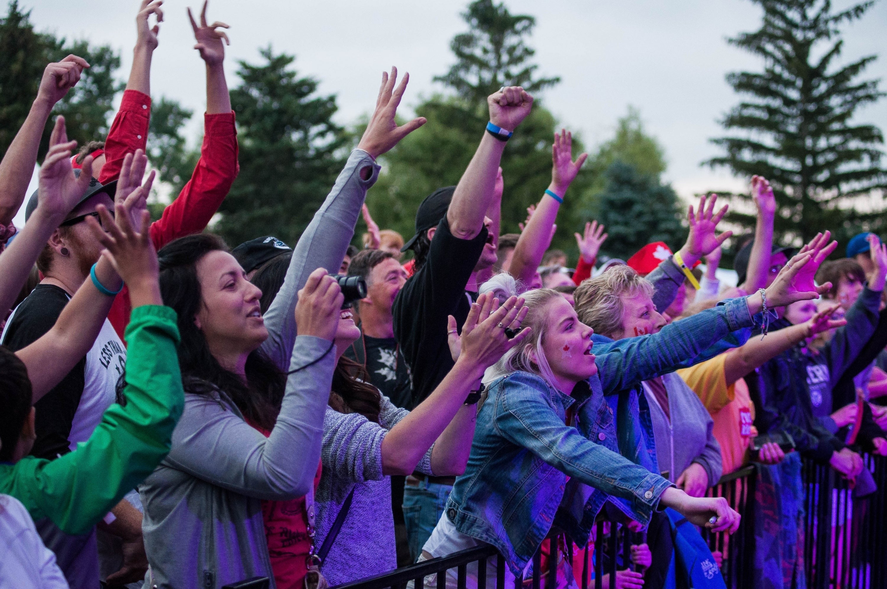 Crowds at the Canada Day celebration respond to live music.