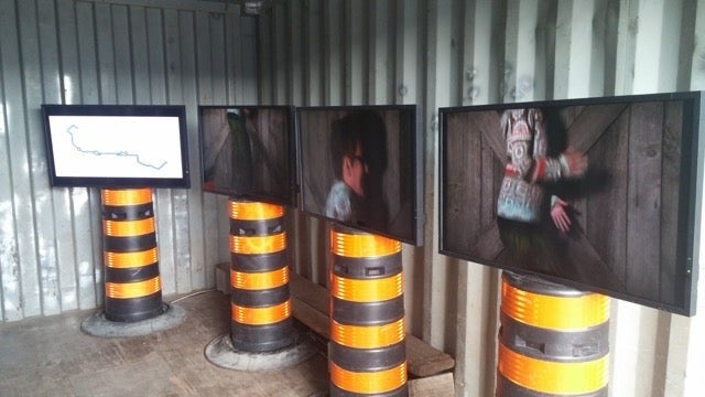 The installation inside a shipping container at the Steel Rails event.