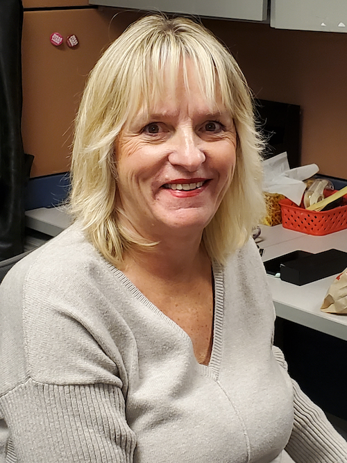 Laurie Hanley at her desk.