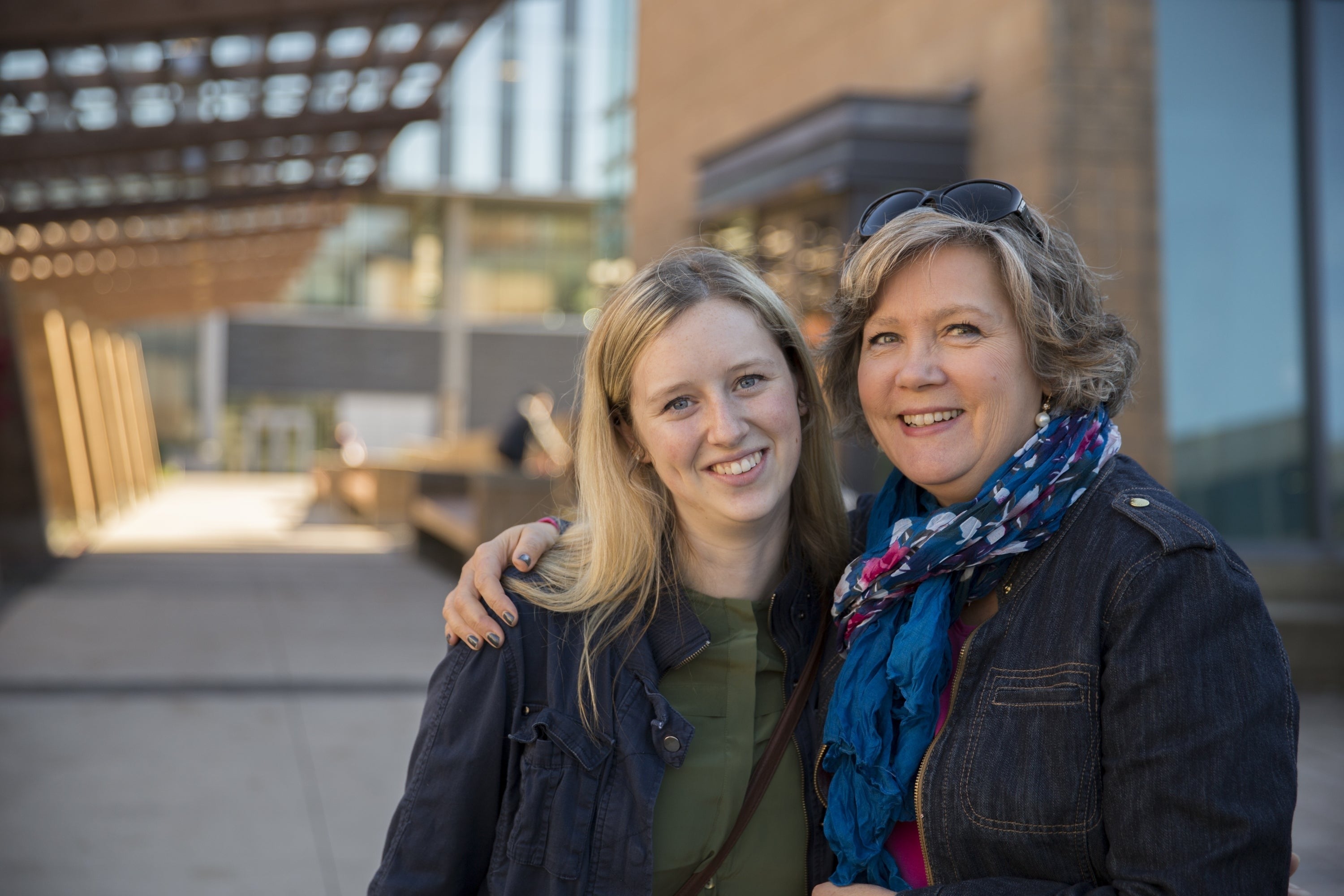 A prospective student with another woman, presumably her parent.