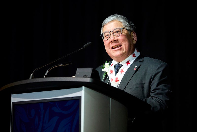 Dr. Fong addresses the audience at the CMHF event.