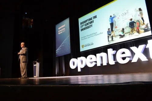 President Feridun Hamdullahpur speaks on stage at the Open Text Future Forward event.