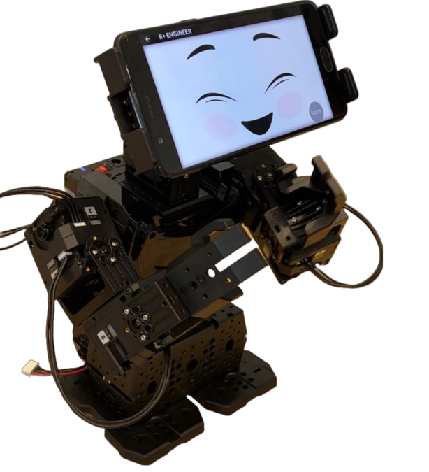 An anthromorphic robot with a tablet-screen 'head' featuring a smiley face.