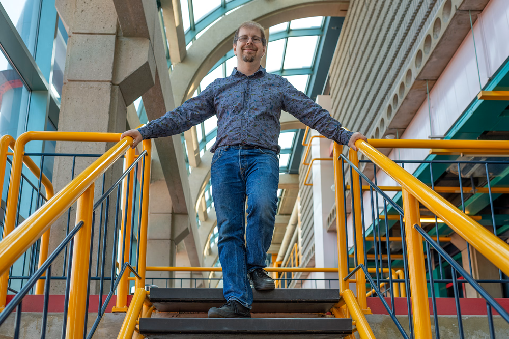 Dan Brown on the stairs at DC.