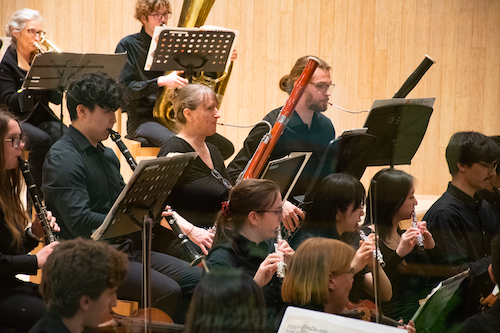 Members of the University Choir singing.