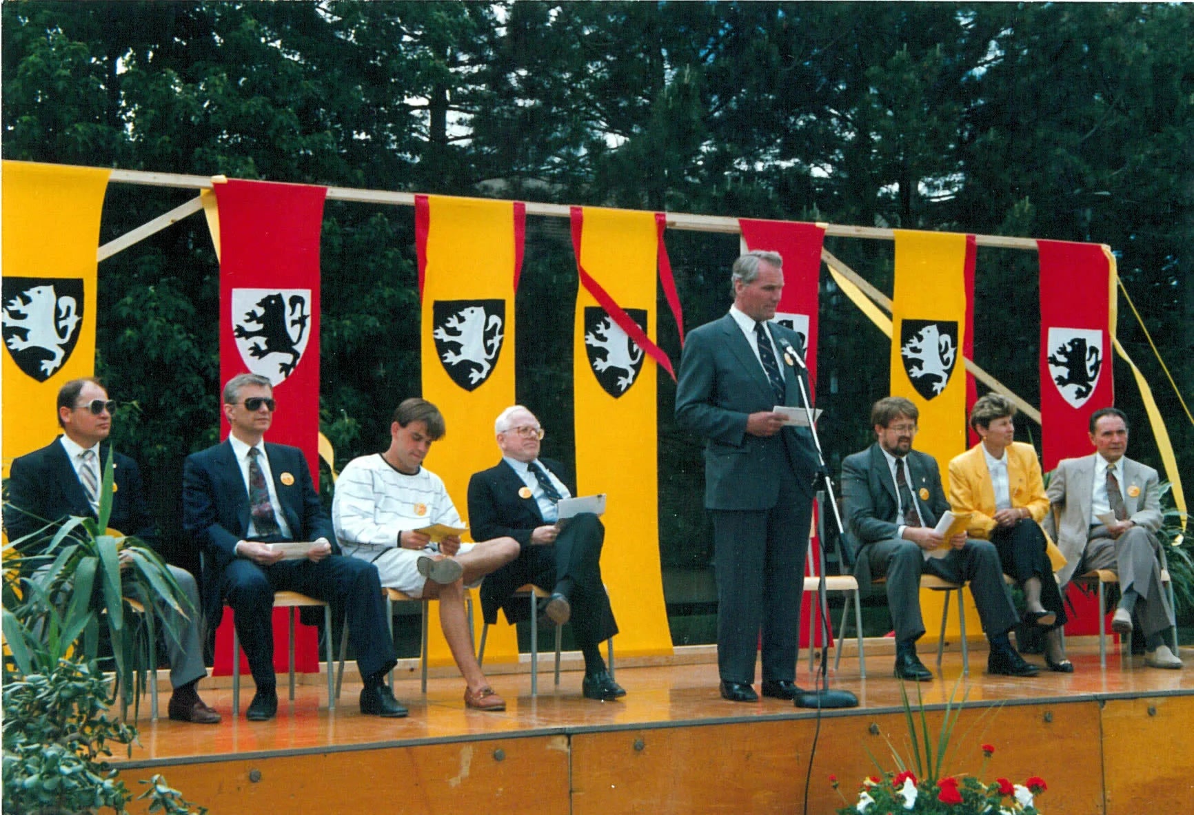 Patrick Mihm on stage with Doug Wright, Burt Matthews, and other Waterloo representatives.