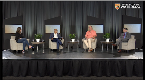 President Vivek Goel and the panelists on stage at Fed Hall.