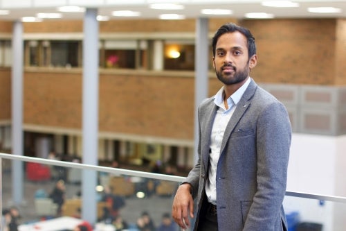 Vanier Scholar Robin Mazumder in the Hagey Atrium.