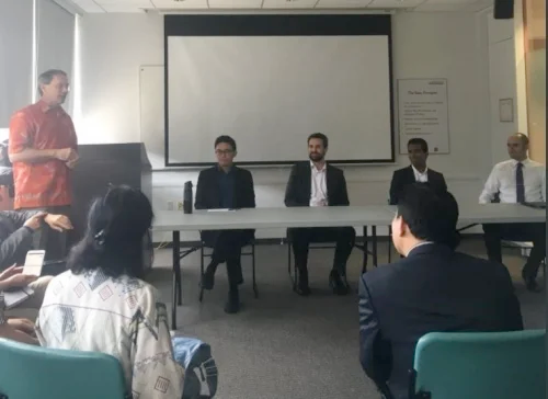 Panel members Dan Barry from Sun Life Financial, Waterloo co-op student Navin Vigneswaren, Geoff Williams from Manulife Financial, and Waterloo co-op student Nicholas Tan