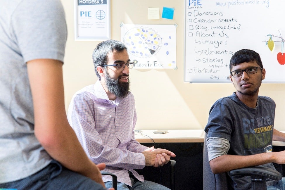 Peace and Conflict Studies students converse at Conrad Grebel.