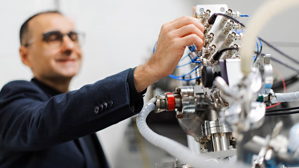 Dr. Raffi Budakian touching a magnetic resonance force microscope