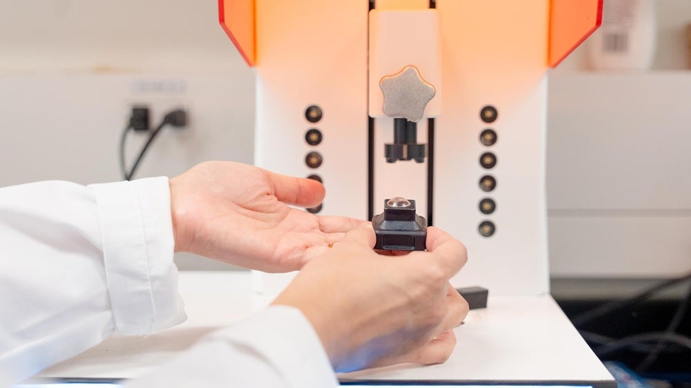 A close-up of the 3D-printed contact lens on the printing platform in University of Waterloo’s Tang Nanotechnology Lab.