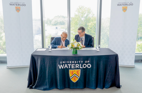 Dr. Vivek Goel and Dr. Reinhold Geilsdörfer, chief executive officer of the Dieter Schwarz Foundation, at the gift announcement and signing ceremony. 