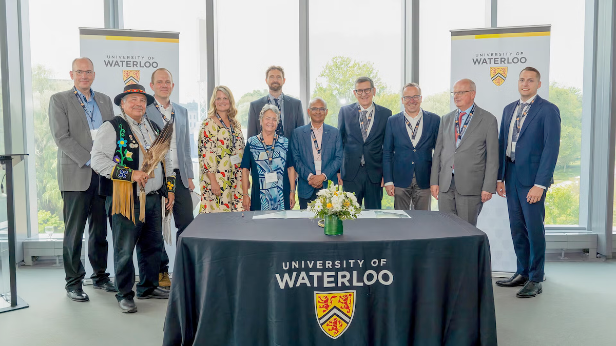 Representatives from the University of Waterloo and the Dieter Schwarz Foundation gather for a group photo.