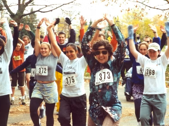 A hippie warms up with other participants at the 2000 Fun Run.