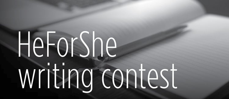 &quot;HeForShe Writing Contest&quot; superimposed over an open book with a pencil in the margins.