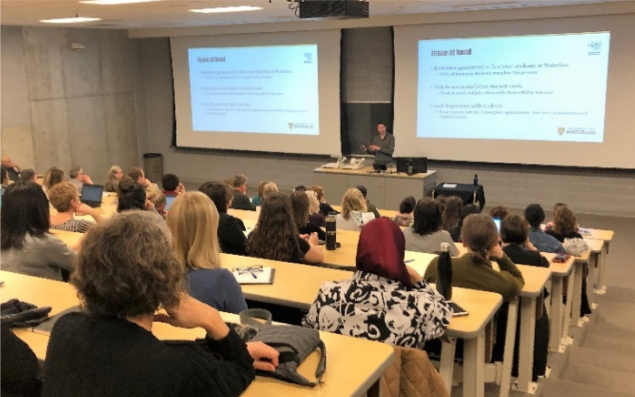Employees attend a continuous improvement workshop.