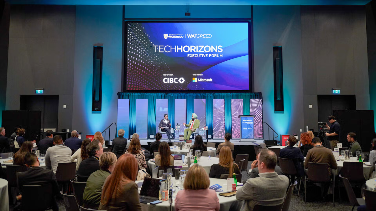 Chancellor Dr. Jagdeep Singh Bachher is interviewed on the stage of the Tech Horizons forum.