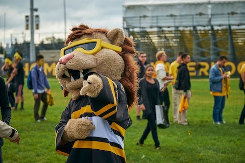 King Warrior on the football field during Orientation.