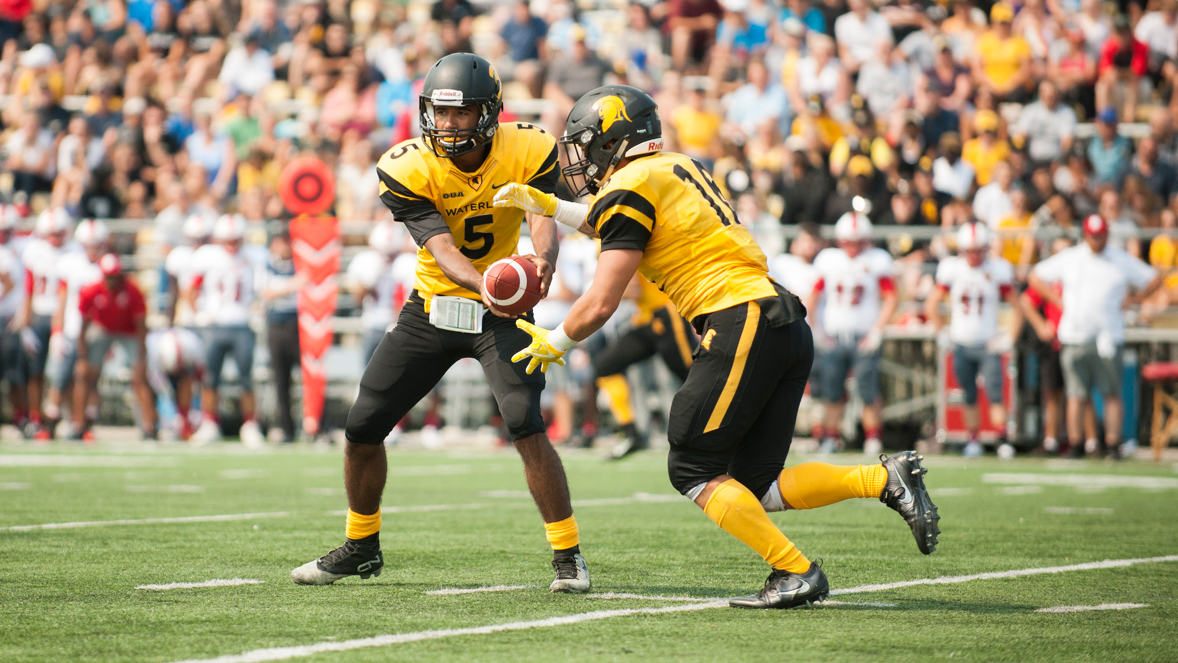 Waterloo Warriors playing football.