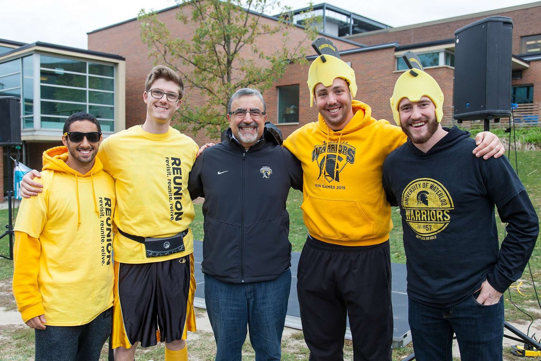 President Feridun Hamdullahpur stands with participants at Reunion.