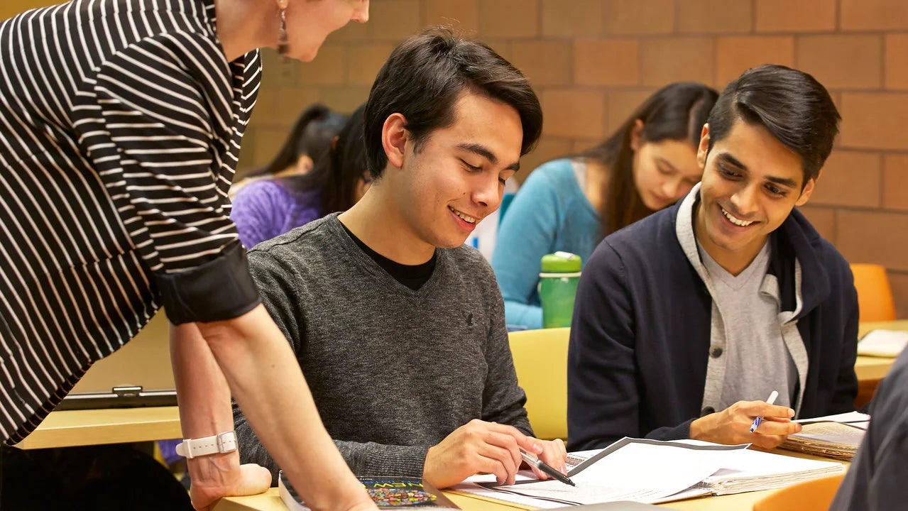 Students working on a project in a classroom.