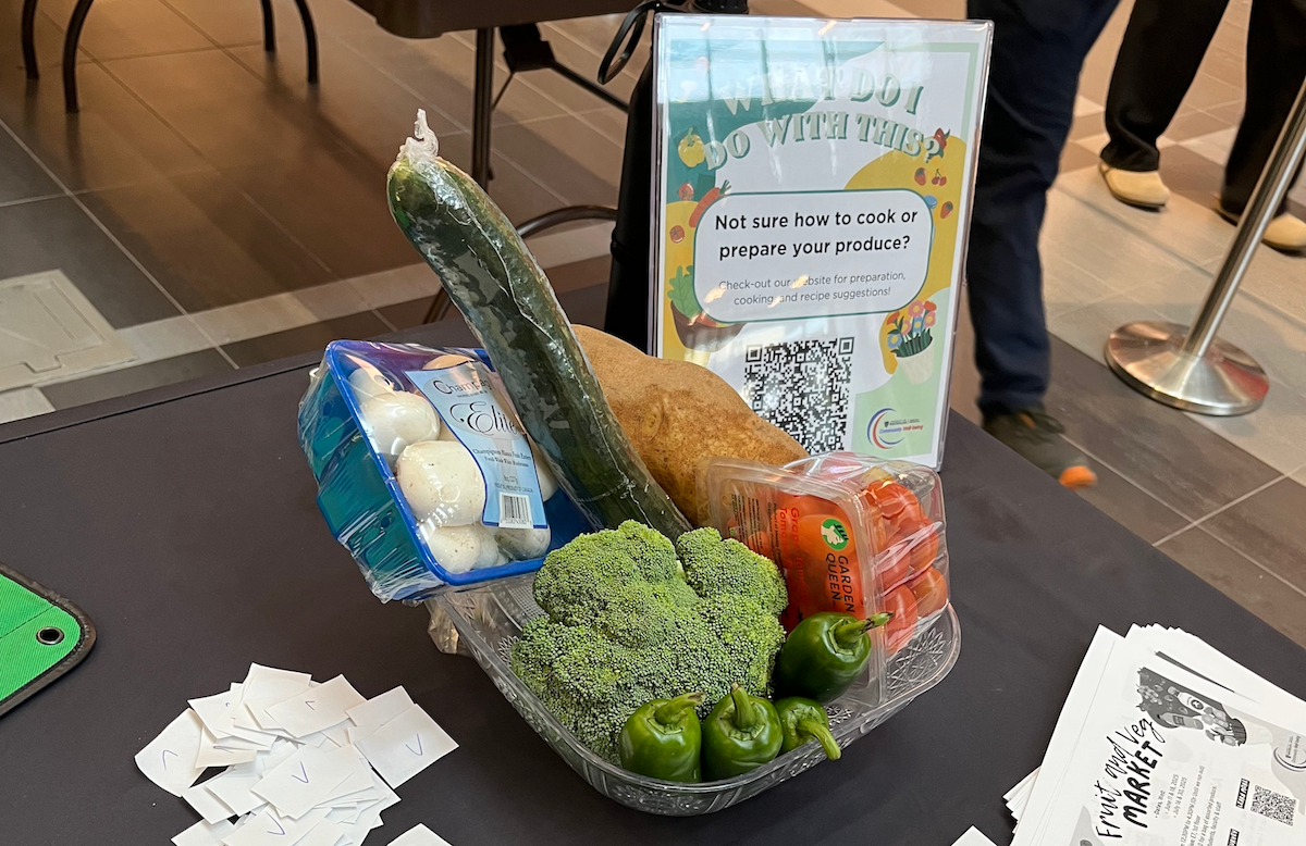 A basket of vegetables at the fruit and veg market.