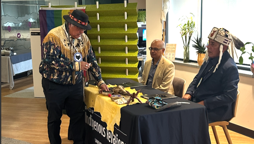 Myeengun Henry, President Vivek Goel, and Chief Joe Miskokomon of Chippewas of the Thames First Nation during the MOU signing ceremony.