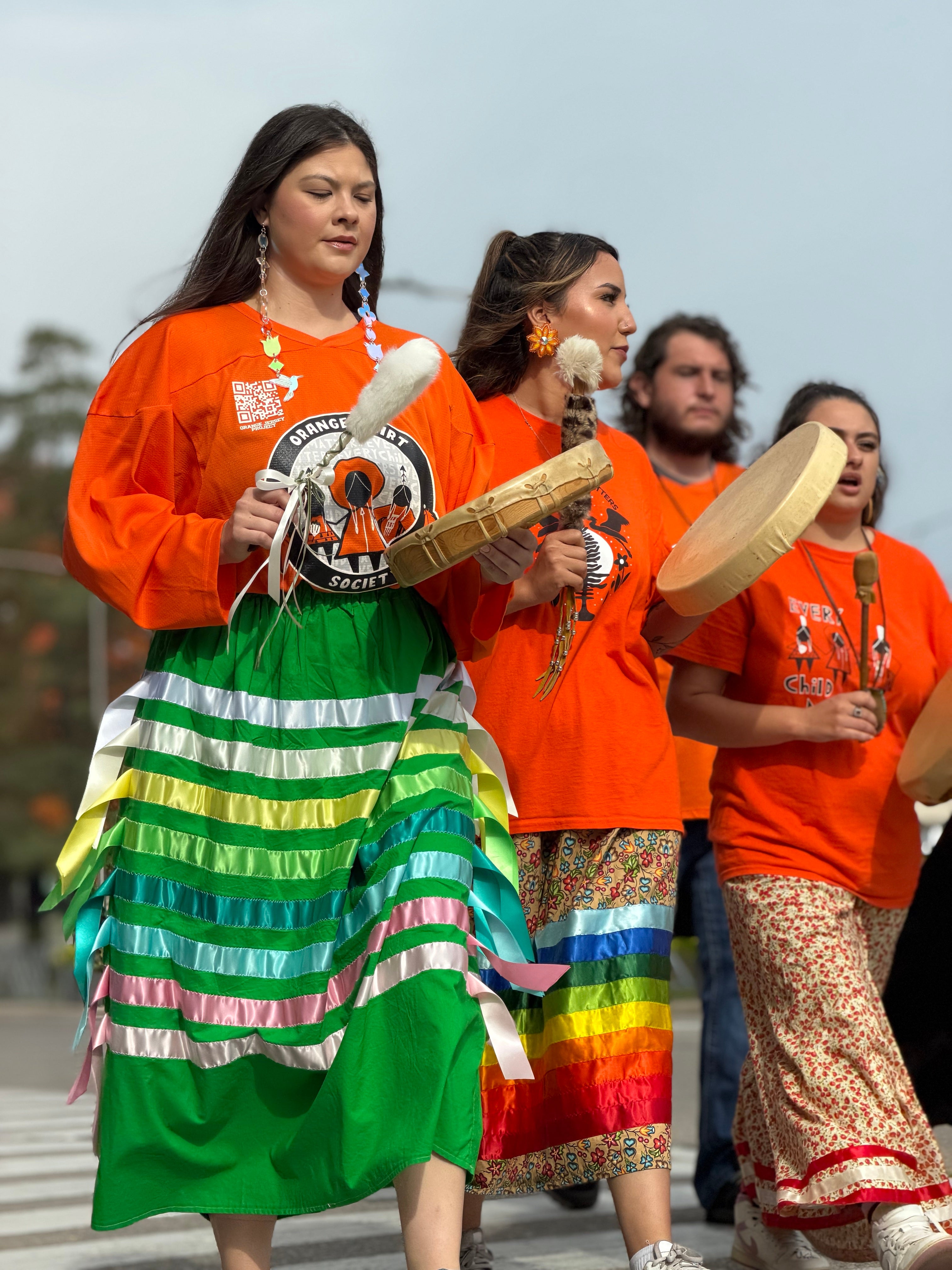 Drummers in ribbon skirts at National Day for Truth and Reconciliation