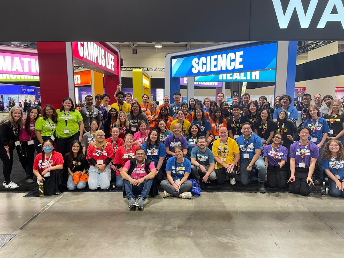 Waterloo staff, students and faculty at the OUF booth.