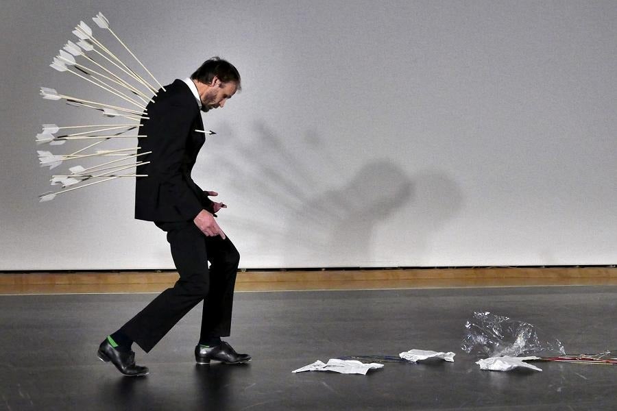 Bill Coleman, his body perforated by arrows, performs in a scene from his production &quot;Dollhouse&quot;