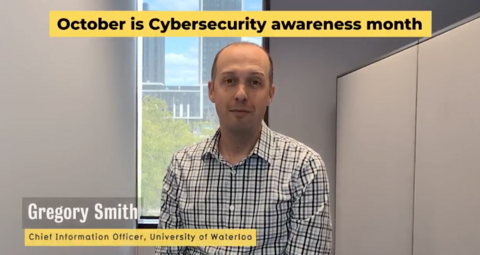 Greg Smith sits at a table in a video screenshot.