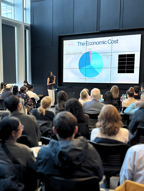 Student pitches to audience during Problem Pitch Finals