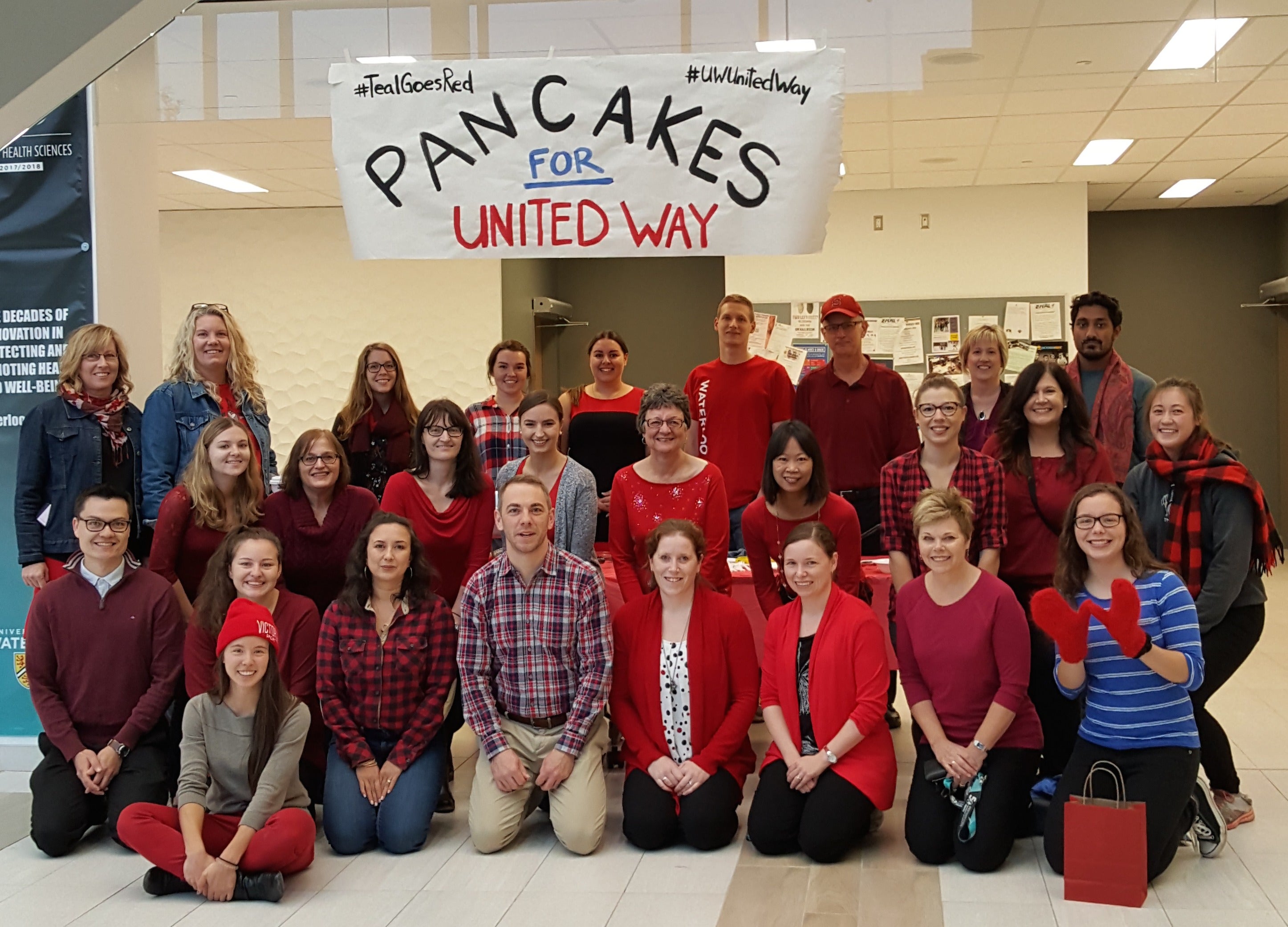 Members of Applied Health Sciences pose as a group at their annual United Way pancake breakfast.