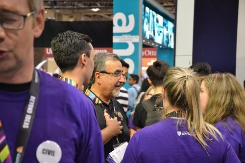 Feridun Hamdullahpur at the University of Waterloo booth at the Ontario Universities' Fair.
