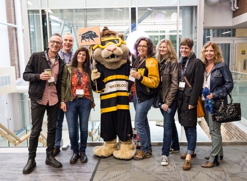 Reunion attendees pose with King Warrior.