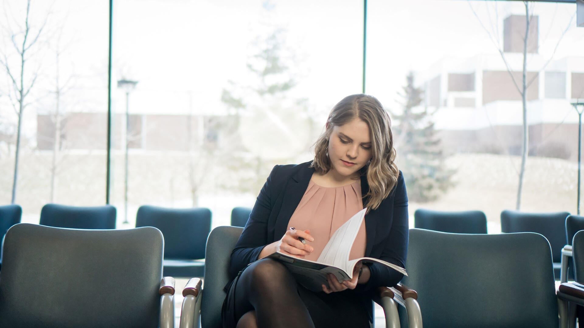 A co-op student sits in the Tatham Centre.