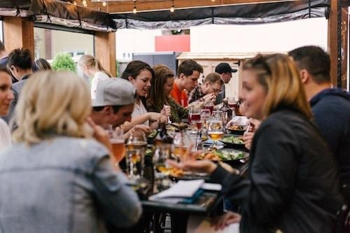 A group of people eating lunch together