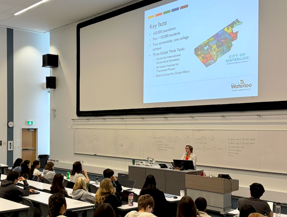 Mayor Dorothy McCabe speaks to a lecture hall full of students.